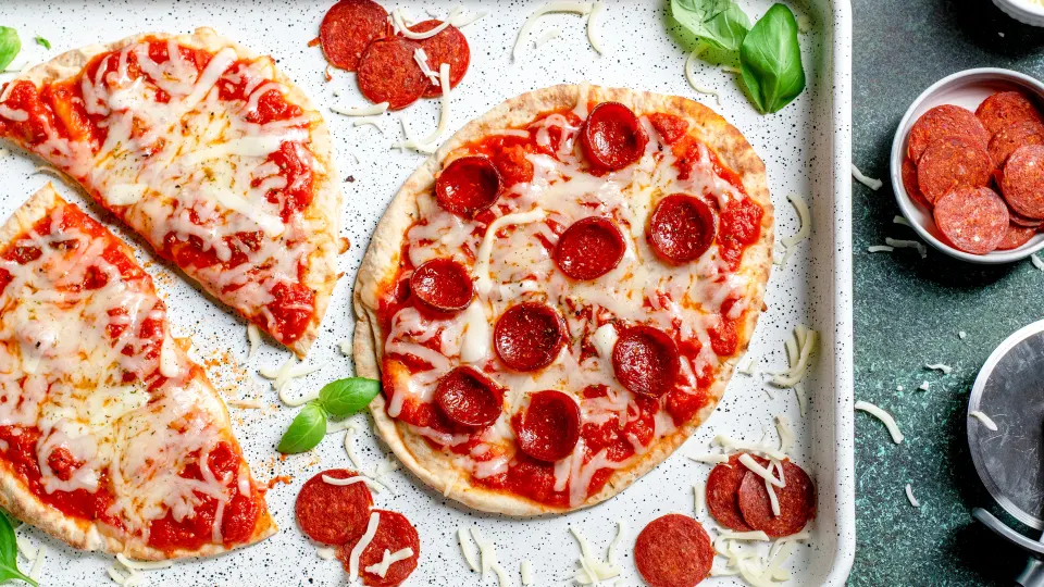  Pita Pizza - https://www.food.com/recipe/easy-pita-bread-pizza-110067